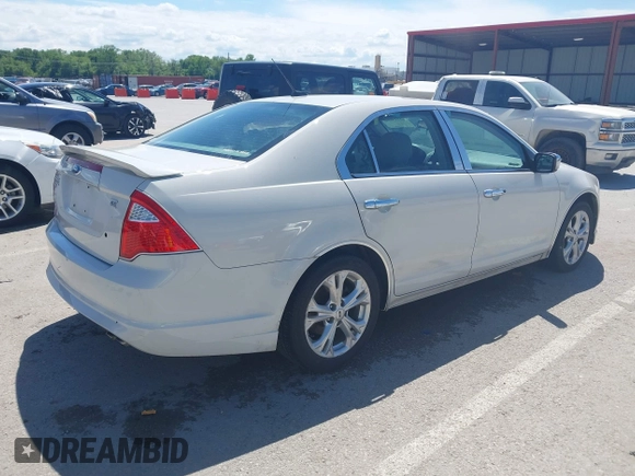 2012 Ford Fusion SE с VIN 3FAHP0HAXCR373441, выставлен на аукционе IAAI как лот 42213666 с пробегом 117 313 миль миль и . История ставок и продаж доступна на DreamBid. Изображение 4.
