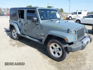 2014 Jeep Wrangler Unlimited Sahara z VIN 1C4HJWEG7EL104869, wystawiony jako IAAI lot #41757377 z przebiegiem 119 100 mil mil oraz . Historia ofert i sprzedaży dostępna na DreamBid. Obrazek 1.