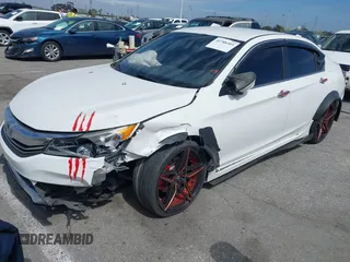 2016 Honda Accord Sport with VIN 1HGCR2F58GA067551, listed as a IAAI auction lot 41788303 with 101,033 mi miles and . Bid and sale history available at DreamBid. Image 2.