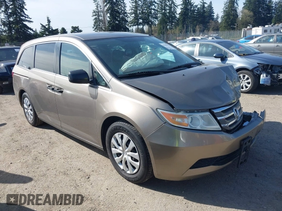 2013 Honda Odyssey LX z VIN 5FNRL5H29DB055166, wystawiony jako IAAI lot #41965037 z przebiegiem 122 470 mil mil oraz . Historia ofert i sprzedaży dostępna na DreamBid. Obrazek 1.