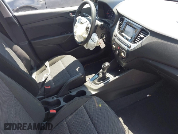 2022 Hyundai Accent SE with VIN 3KPC24A60NE179575, listed as a IAAI auction lot 42212795 with 20,761 mi miles and . Bid and sale history available at DreamBid. Image 5.