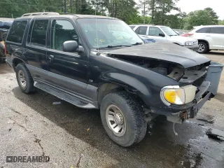 2000 Mercury Mountaineer with VIN 4M2DU66P2YUJ35413, listed as a Copart auction lot 52535624 with 343,752 mi miles and Salvage Title. Bid and sale history available at carsss.com. Image 4.