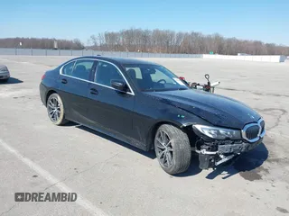 2020 BMW 3 Series 330i xDrive with VIN 3MW5R7J05L8B34626, listed as a IAAI auction lot 41772911 with 59,578 mi miles. Bid and sale history available at carsss.com. Image 1.