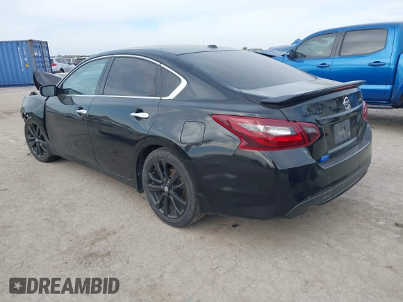 2018 Nissan Altima 2.5 SR with VIN 1N4AL3AP3JC298848, listed as a IAAI auction lot 40966335 with 121,163 mi miles. Bid and sale history available at carsss.com. Image 3.
