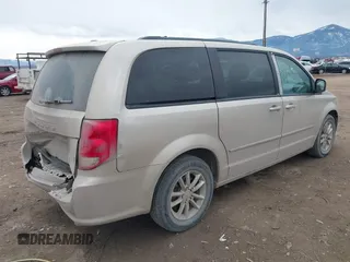 2014 Dodge Grand Caravan SXT z VIN 2C4RDGCG8ER253786, wystawiony jako IAAI lot #41771226 z przebiegiem 175 507 mil mil oraz . Historia ofert i sprzedaży dostępna na DreamBid. Obrazek 4.