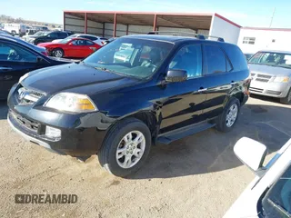 2004 Acura MDX Touring Pkg w/Navigation with VIN 2HNYD18804H525580, listed as a IAAI auction lot 41815839 with 281,295 mi miles. Bid and sale history available at carsss.com. Image 2.