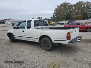 1999 Toyota Tacoma z VIN 4TAVL52N6XZ555376, wystawiony jako Copart lot #85763154 z przebiegiem 229 914 mil mil oraz Nie do naprawy • Non repairable. Historia ofert i sprzedaży dostępna na DreamBid. Obrazek 2.