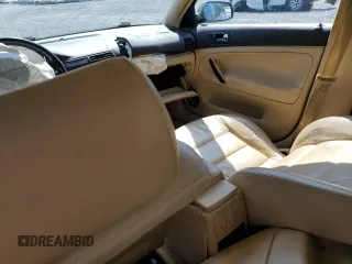 2003 Volkswagen Passat GLX z VIN WVWYH63B23E326238, wystawiony jako Copart lot #70220704 z przebiegiem 167 857 mil mil oraz Szkoda całkowita • Salvage title. Historia ofert i sprzedaży dostępna na DreamBid. Obrazek 8.