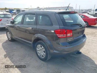 2015 Dodge Journey American Value Pkg with VIN 3C4PDCAB2FT641361, listed as a IAAI auction lot 40299991 with 202,003 mi miles. Bid and sale history available at carsss.com. Image 3.