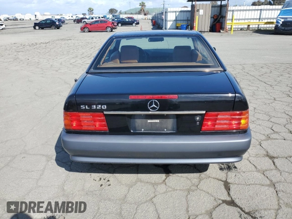 1994 Mercedes-Benz SL with VIN WDBFA63E1RF100599, listed as a Copart auction lot 51619785 with 111,720 mi miles and Clean title. Bid and sale history available at DreamBid. Image 6.