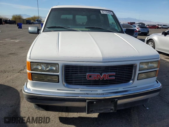 1999 GMC Suburban with VIN 3GKEC16R6XG538009, listed as a Copart auction lot 87112424 with 220,487 mi miles and Clean Title. Bid and sale history available at DreamBid. Image 5.