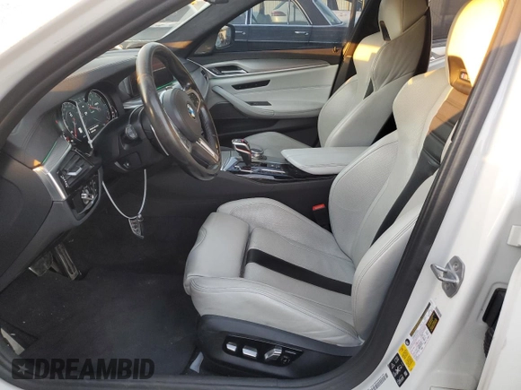 2019 BMW M5 z VIN WBSJF0C53KB284878, wystawiony jako Copart lot #86763564 z przebiegiem Nie podano mil oraz Szkoda całkowita • Salvage title. Historia ofert i sprzedaży dostępna na DreamBid. Obrazek 7.