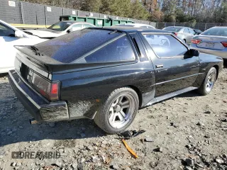 1987 Chrysler Conquest z VIN JJ3CC54N1HZ023316, wystawiony jako Copart lot #83362964 z przebiegiem 196 755 mil mil oraz Szkody całkowita. Historia ofert i sprzedaży dostępna na DreamBid. Obrazek 3.