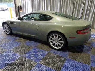 2005 Aston Martin DB9 z VIN SCFAD01A25GA00018, wystawiony jako Copart lot #84703534 z przebiegiem 19 831 mil mil oraz Tytuł czysty. Historia ofert i sprzedaży dostępna na DreamBid. Obrazek 2.