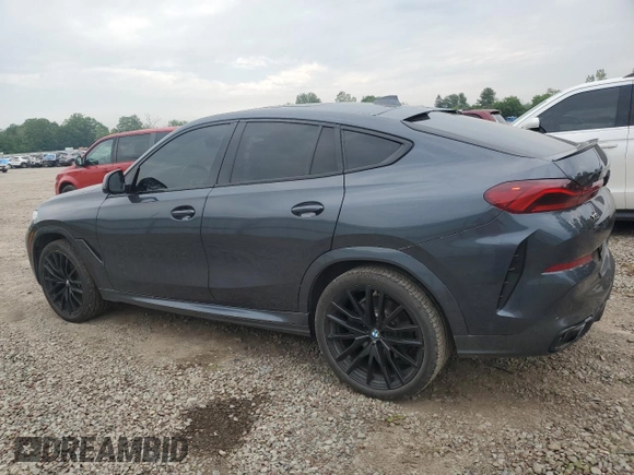 2021 BMW X6 M50i z VIN 5UXCY8C04M9D98591, wystawiony jako Copart lot #60606155 z przebiegiem 90 639 mil mil oraz Czysty tytuł • Clean title. Historia ofert i sprzedaży dostępna na DreamBid. Obrazek 2.