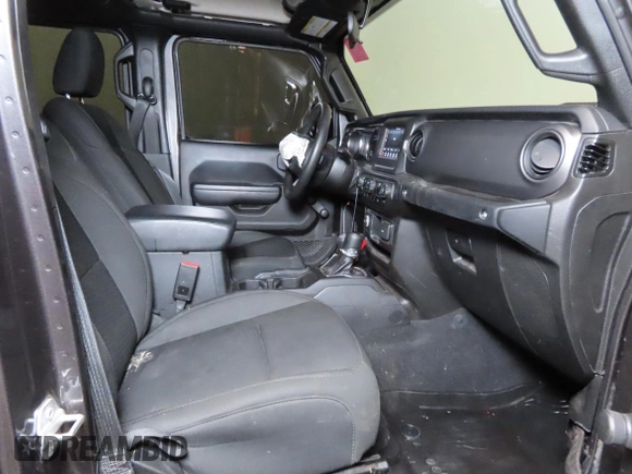 2023 Jeep Gladiator Freedom with VIN 1C6JJTAG9PL557861, listed as a Copart auction lot 56429485 with 44,716 mi miles and Salvage title. Bid and sale history available at DreamBid. Image 5.