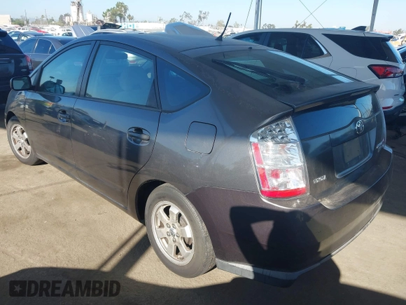 2007 Toyota Prius z VIN JTDKB20U873226409, wystawiony jako IAAI lot #42541909 z przebiegiem 128 374 mil mil oraz . Historia ofert i sprzedaży dostępna na DreamBid. Obrazek 3.