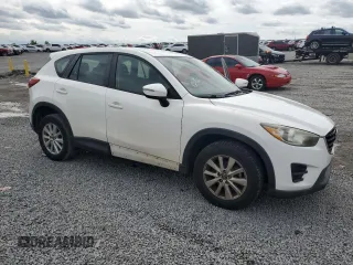 2016 Mazda CX-5 Sport with VIN JM3KE2BYXG0640842, listed as a Copart auction lot 54017605 with 197,504 mi miles and Clean Title. Bid and sale history available at carsss.com. Image 4.
