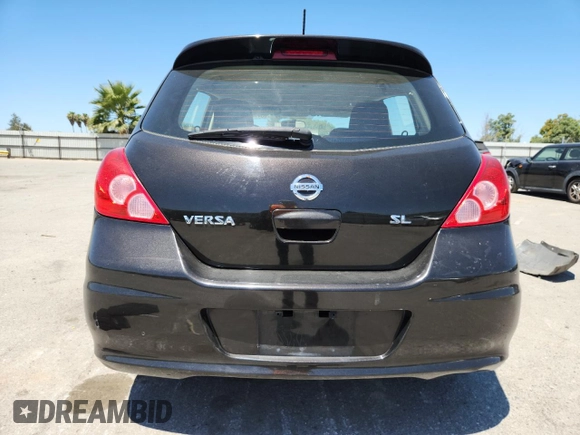 2011 Nissan Versa S with VIN 3N1BC1CP1BL457889, listed as a Copart auction lot 63414385 with 120,303 mi miles and Salvage title. Bid and sale history available at DreamBid. Image 6.