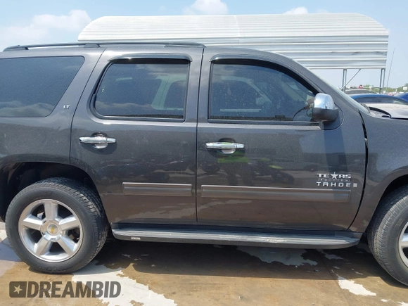 2010 Chevrolet Tahoe LS with VIN 1GNUCAE02AR290222, listed as a IAAI auction lot 42321824 with 188,926 mi miles and . Bid and sale history available at DreamBid. Image 12.