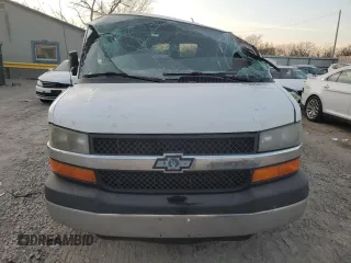 2014 Chevrolet Express Passenger LT with VIN 1GAZG1FGXE1187397, listed as a Copart auction lot 43209785 with 168,614 mi miles and Salvage title. Bid and sale history available at DreamBid. Image 5.