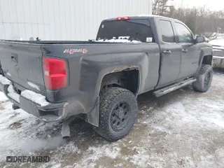 2015 Chevrolet Silverado 1500 LT with VIN 1GCVKREHXFZ350047, listed as a IAAI auction lot 41315609 with 134,560 mi miles. Bid and sale history available at carsss.com. Image 4.