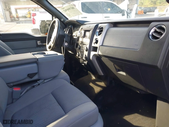 2013 Ford F-150 XL with VIN 1FTFW1CT9DKD02756, listed as a IAAI auction lot 40759592 with 218,975 mi miles. Bid and sale history available at carsss.com. Image 5.