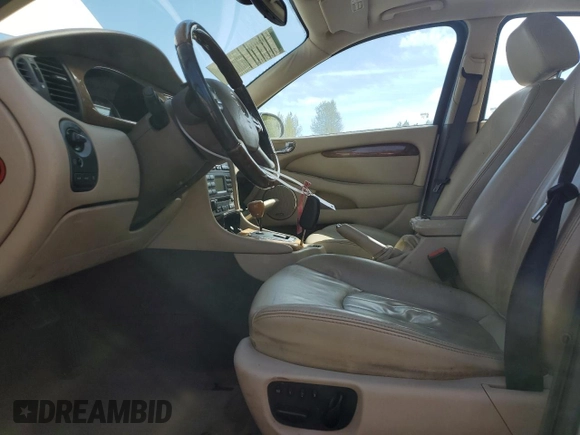 2006 Jaguar X-Type with VIN SAJWA51A06WE68591, listed as a Copart auction lot 53020355 with 179,379 mi miles and Salvage Title. Bid and sale history available at DreamBid. Image 7.