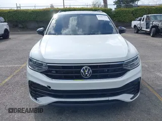 2023 Volkswagen Tiguan SE R-Line Black with VIN 3VVCB7AX3PM133002, listed as a IAAI auction lot 41902721 with 32,915 mi miles and . Bid and sale history available at DreamBid. Image 12.
