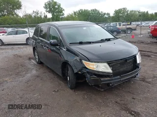 2011 Honda Odyssey EX-L with VIN 5FNRL5H6XBB082439, listed as a IAAI auction lot 42324939 with 235,489 mi miles and . Bid and sale history available at DreamBid. Image 1.