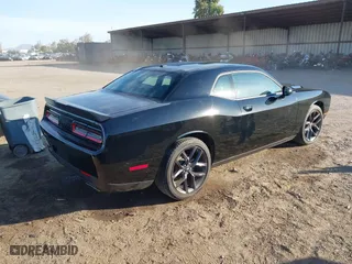 2023 Dodge Challenger SXT with VIN 2C3CDZAG0PH597128, listed as a IAAI auction lot 40865123 with 9,362 mi miles. Bid and sale history available at carsss.com. Image 4.