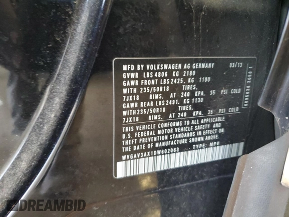 2013 Volkswagen Tiguan S with VIN WVGAV3AX1DW602083, listed as a Copart auction lot 57977515 with 114,375 mi miles and Clean title. Bid and sale history available at DreamBid. Image 13.