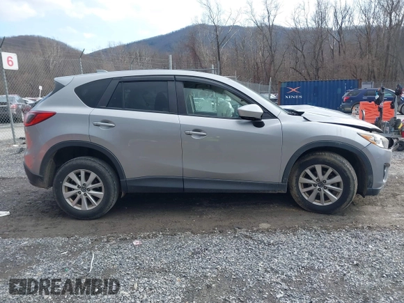 2013 Mazda CX-5 Touring with VIN JM3KE2CE9D0133348, listed as a IAAI auction lot 41357592 with 122,227 mi miles. Bid and sale history available at carsss.com. Image 12.
