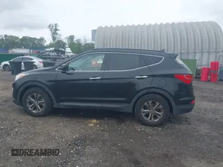 2014 Hyundai Santa Fe z VIN 5XYZUDLB9EG224174, wystawiony jako IAAI lot #42244140 z przebiegiem 84 341 mil mil oraz . Historia ofert i sprzedaży dostępna na DreamBid. Obrazek 14.