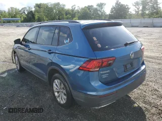 2018 Volkswagen Tiguan S with VIN 3VV0B7AX2JM019924, listed as a Copart auction lot 56138375 with 76,798 mi miles and Salvage title. Bid and sale history available at DreamBid. Image 2.