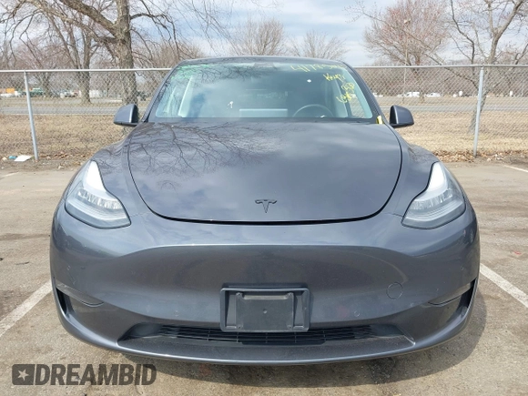 2021 Tesla Model Y Standard Range z VIN 5YJYGDED2MF118205, wystawiony jako IAAI lot #41785040 z przebiegiem 63 628 mil mil oraz . Historia ofert i sprzedaży dostępna na DreamBid. Obrazek 12.
