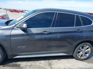 2017 BMW X1 xDrive28i with VIN WBXHT3Z33H4A65198, listed as a IAAI auction lot 41798503 with 88,951 mi miles. Bid and sale history available at carsss.com. Image 14.