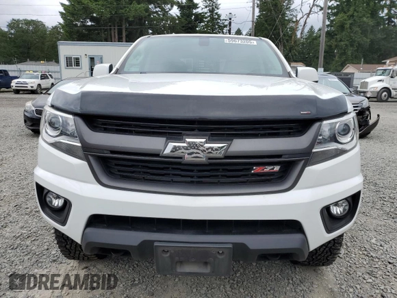 2018 Chevrolet Colorado 4WD Z71 with VIN 1GCPTDE11J1140908, listed as a Copart auction lot 59673205 with 104,799 mi miles and Clean title. Bid and sale history available at DreamBid. Image 5.