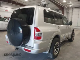 2002 Mitsubishi Montero Limited z VIN JA4MW51RX2J048087, wystawiony jako IAAI lot #42096678 z przebiegiem 218 795 mil mil oraz . Historia ofert i sprzedaży dostępna na DreamBid. Obrazek 4.