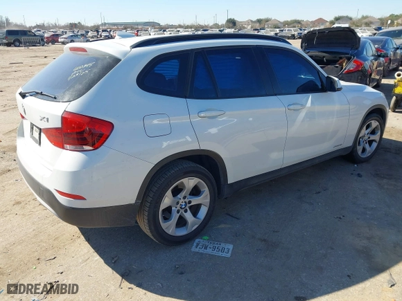 2015 BMW X1 sDrive28i with VIN WBAVM1C51FVZ94433, listed as a IAAI auction lot 41425205 with 148,346 mi miles. Bid and sale history available at carsss.com. Image 4.