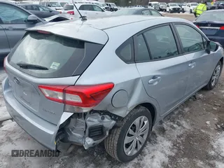 2018 Subaru Impreza with VIN 4S3GTAA65J1740704, listed as a IAAI auction lot 41723889 with 53,679 mi miles. Bid and sale history available at carsss.com. Image 4.