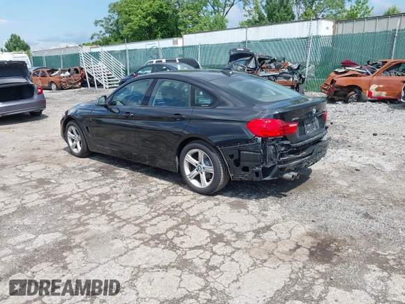 2015 BMW 4 Series 428i xDrive with VIN WBA4C9C52FD331620, listed as a IAAI auction lot 42556526 with 115,674 mi miles and . Bid and sale history available at DreamBid. Image 3.