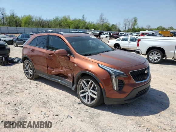 2019 Cadillac XT4 AWD Sport with VIN 1GYFZFR42KF136567, listed as a Copart auction lot 52018445 with 99,944 mi miles and Salvage title. Bid and sale history available at DreamBid. Image 4.
