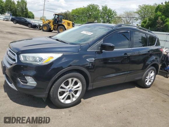 2017 Ford Escape SE z VIN 1FMCU0GD5HUA47616, wystawiony jako Copart lot #57180915 z przebiegiem 193 358 mil mil oraz Czysty tytuł • Clean title. Historia ofert i sprzedaży dostępna na DreamBid. Obrazek 1.