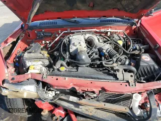 2002 Nissan Frontier 4WD SVE SuperCharger with VIN 1N6MD26Y42C377444, listed as a Copart auction lot 68996684 with 123,895 mi miles and Salvage Title. Bid and sale history available at carsss.com. Image 11.