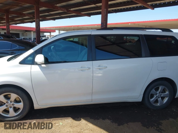 2012 Toyota Sienna LE AAS with VIN 5TDKK3DC4CS274117, listed as a IAAI auction lot 42008690 with 205,353 mi miles. Bid and sale history available at carsss.com. Image 14.