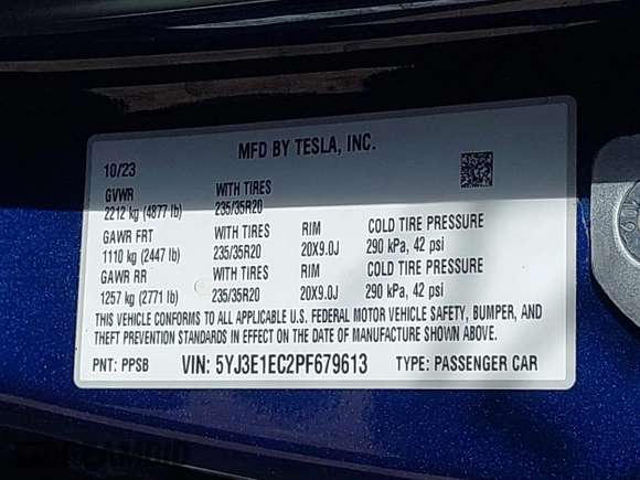 2023 Tesla Model 3 Performance with VIN 5YJ3E1EC2PF679613, listed as a IAAI auction lot 42099199 with 21,721 mi miles. Bid and sale history available at carsss.com. Image 9.
