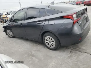 2021 Toyota Prius L Eco with VIN JTDKAMFU8M3130779, listed as a Copart auction lot 56452395 with 86,094 mi miles and Salvage title. Bid and sale history available at DreamBid. Image 2.