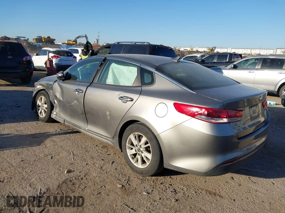 2016 Kia Optima LX with VIN 5XXGT4L39GG102599, listed as a IAAI auction lot 41748147 with 104,712 mi miles. Bid and sale history available at carsss.com. Image 3.