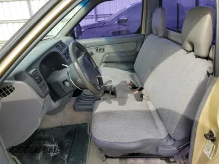 1999 Nissan Frontier XE with VIN 1N6DD21S9XC312809, listed as a Copart auction lot 57702005 with 174,183 mi miles and Clean title. Bid and sale history available at DreamBid. Image 7.